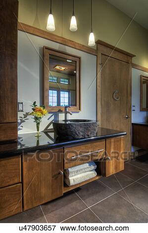 Stock Photo - Custom designed master bath vanity with granite sink; Loxahatchee; Florida; USA. Fotosearch
