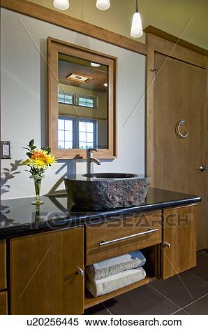 Stock Photography - Custom designed master bath vanity with granite sink; Loxahatchee; Florida; USA. Fotosearch