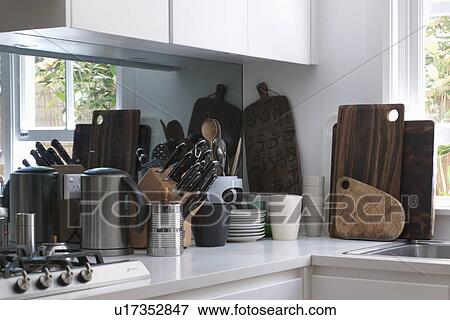 Cutting boards and knives on countertop in kitchen; Sydney; Australia View Large Photo Image Stock Photo - Cutting boards and knives on countertop in kitchen; Sydney; Australia. Fotosearch