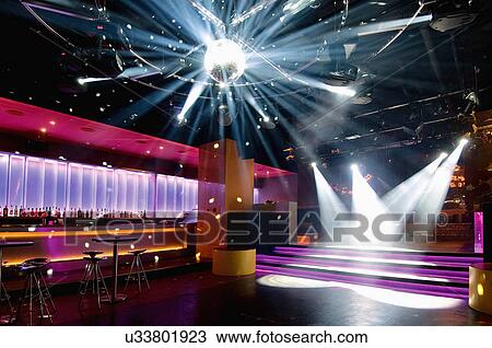Dance floor with disco ball at nightclub View Large Photo Image Stock Image - Dance floor with disco ball at nightclub. Fotosearch