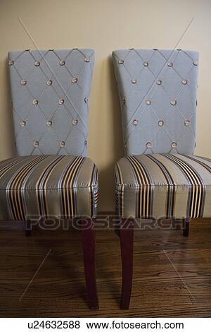 Decorative chairs with striped seats and blue chair backs; Victorville; California; USA View Large Photo Image Stock Photo - Decorative chairs with striped seats and blue chair backs; Victorville; California; USA. Fotosearch