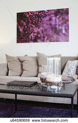 Decorative glasses on coffee table in living room View Large Photo Image Stock Photo - Decorative glasses on coffee table in living room. Fotosearch