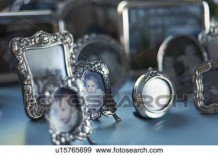 Decorative picture frames on table View Large Photo Image Stock Photo - Decorative picture frames on table. Fotosearch