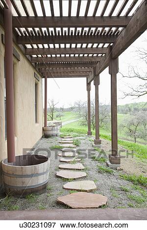 Detail arbor above stone walkway; Porterville; California; USA View Large Photo Image Stock Photo - Detail arbor above stone walkway; Porterville; California; USA. Fotosearch