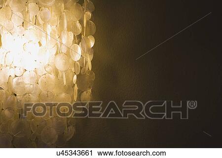 Stock Image - Detail beaded light fixture; Aliso Viejo;. USA. Fotosearch