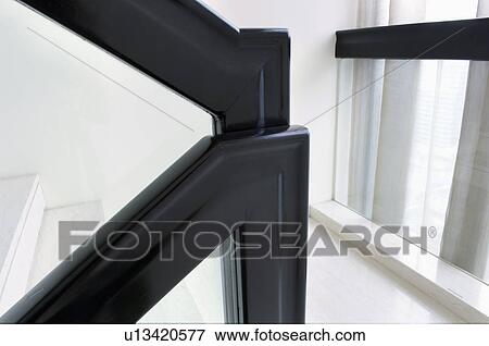 Detail Black Banister And Handrail Along Staircase Stock Photo