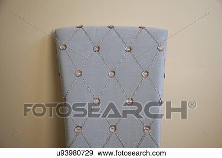 Detail blue chair back with buttons; Victorville; California; USA View Large Photo Image Stock Photo - Detail blue chair back with buttons; Victorville; California; USA. Fotosearch