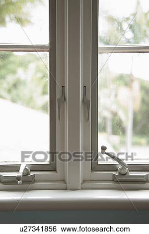 Detail casement crank windows; Carpinteria; California; USA View Large Photo Image Stock Photograph - Detail casement crank windows; Carpinteria; California; USA. Fotosearch