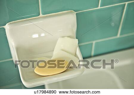 Stock Image - Detail collection of soap on built in soap dish; Carpinteria; California; USA. Fotosearch