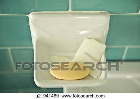 Stock Photo - Detail collection of soap on built in soap dish; Carpinteria; California; USA. Fotosearch