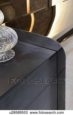 Stock Image - Detail end table with decoration. Fotosearch