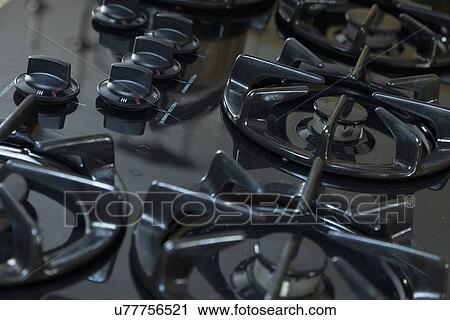 Stock Image - Detail gas stove top; Burbank; California; USA. Fotosearch