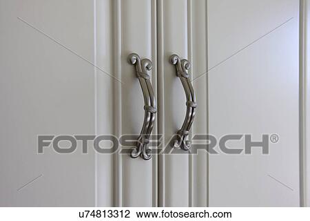 Detail handles on cabinet doors; Laguna Beach; California; USA View Large Photo Image Stock Image - Detail handles on cabinet doors; Laguna Beach; California; USA. Fotosearch