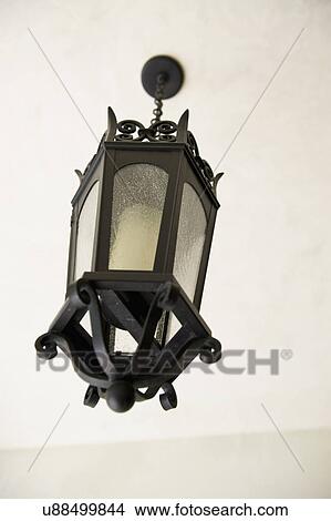 Picture - Detail Italianate lantern style chandelier; Irvine; California; USA. Fotosearch