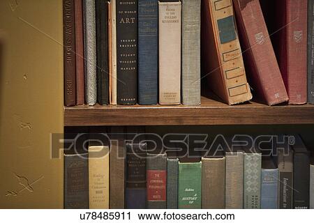 Stock Image - Detail of books on bookshelf; Irvine; California; USA. Fotosearch