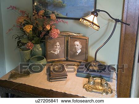 Detail of family photos and Victorian style lamp; St. Paul; Minnesota; USA View Large Photo Image Stock Image - Detail of family photos and Victorian style lamp; St. Paul; Minnesota; USA. Fotosearch