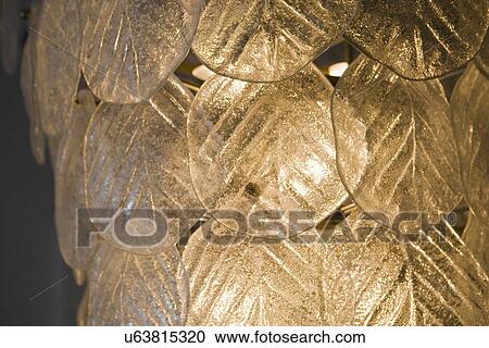 Stock Image - Detail of glass chandelier; Hollywood; California; USA. Fotosearch