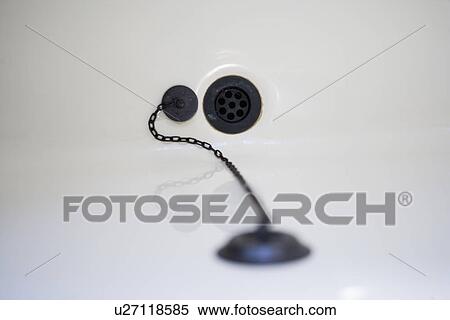 Stock Photography - Detail of unplugged bathtub drain; Irvine; California; USA. Fotosearch