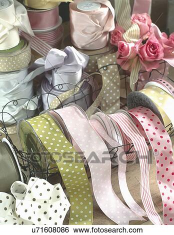 Detail of various French ribbons and stacked pink roses View Large Photo Image Stock Photograph - Detail of various French ribbons and stacked pink roses. Fotosearch