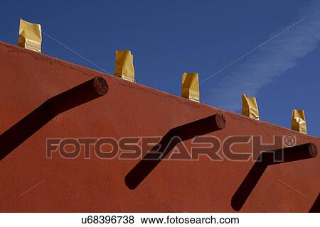 Detail of vigas on top of adobe building, USA, New Mexico, Santa Fe View Large Photo Image Stock Photo - Detail of vigas on top of adobe building, USA, New Mexico, Santa Fe. Fotosearch