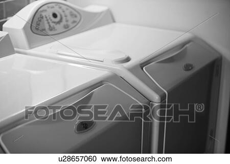 Detail of washer and dryer; black and white; Irvine; California; USA View Large Photo Image Stock Image - Detail of washer and dryer; black and white; Irvine; California; USA. Fotosearch