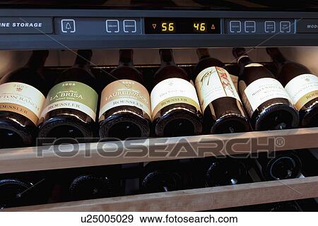 Detail of wine bottles in cooler, Santa Fe, New Mexico, USA View Large Photo Image Stock Photo - Detail of wine bottles in cooler, Santa Fe, New Mexico, USA. Fotosearch