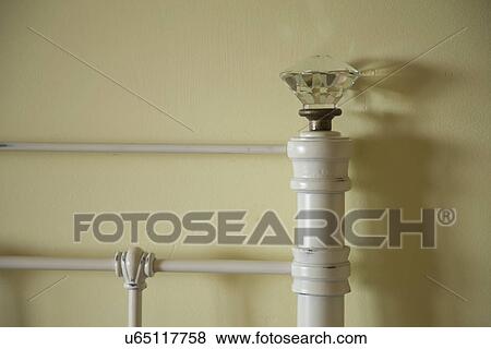 Stock Photo - Detail painted iron headboard; Carpinteria; California; USA. Fotosearch