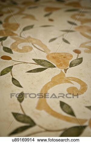 Picture - Detail pear tiles and design on dining table; Irvine; California; USA. Fotosearch