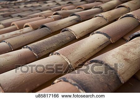 Stock Photograph - Detail red tile roof. Fotosearch