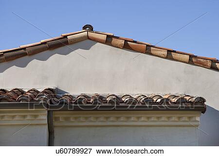 Stock Photo - Detail roof line with red tile roof; Irvine; California; USA. Fotosearch