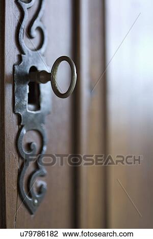 Stock Image - Detail skeleton key in keyhole; Carpinteria; California; USA. Fotosearch