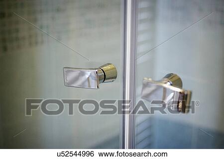 Detail stainless steel knobs on glass shower doors; Italy View Large Photo Image Stock Photograph - Detail stainless steel knobs on glass shower doors; Italy. Fotosearch