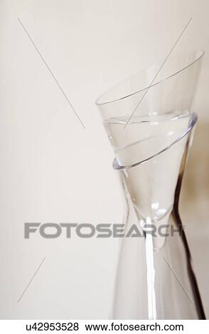 Stock Photo - Detail top of clear glass vase; Ontario; California; USA. Fotosearch