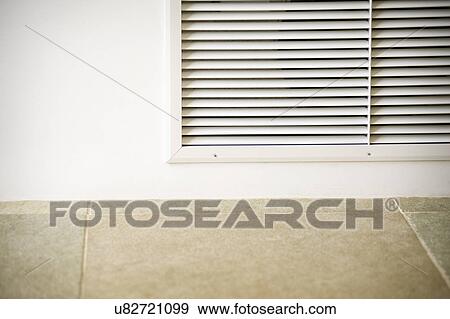 Stock Photo - Detail vent on wall; Cardiff by the Sea; California; USA. Fotosearch