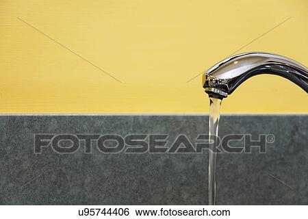 Detail water running from kitchen faucet View Large Photo Image Stock Photograph - Detail water running from kitchen faucet. Fotosearch