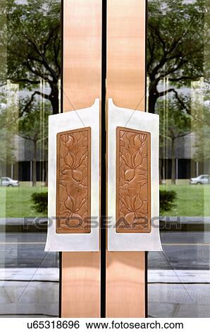 Detail wood carved door handles View Large Photo Image Stock Photograph - Detail wood carved door handles. Fotosearch