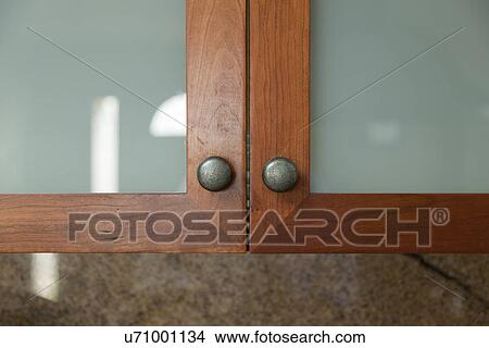 Picture - Detail wooden and glass cabinets; Burbank; California; USA. Fotosearch