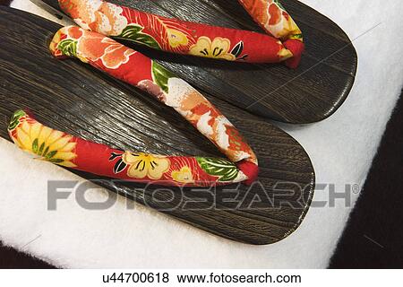 Detail wooden spa sandals on stack of towels; Aliso Viejo; California; USA View Large Photo Image Stock Photo - Detail wooden spa sandals on stack of towels; Aliso Viejo; California; USA. Fotosearch