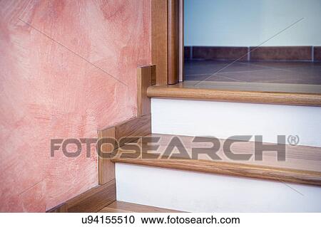 Stock Image - Detail wooden staircase. Fotosearch