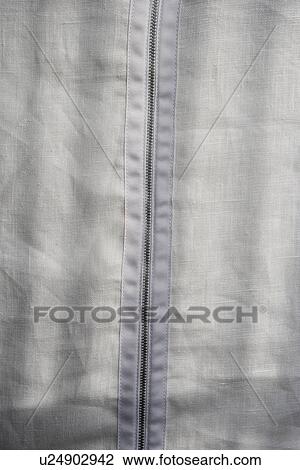 Stock Image - Detail zipper on back of chair cover. Fotosearch