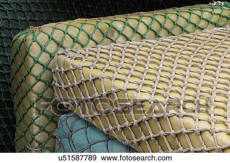 Detailed image of mattress wrapped in commercial fishing net View Large Photo Image Stock Photo - Detailed image of mattress wrapped in commercial fishing net. Fotosearch
