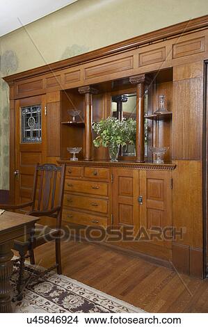 Picture - DINING ROOM: DETAIL built in Renaissance Revival style classical cabinets for display and storage, butlers door, stained glass,. Fotosearch