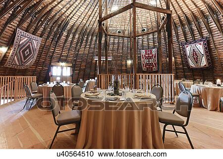 Dining tables set up inside yurt, Ojo Caliente, New Mexico, USA View Large Photo Image Stock Image - Dining tables set up inside yurt, Ojo Caliente, New Mexico, USA. Fotosearch