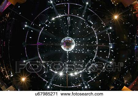 Disco ball hanging from ceiling View Large Photo Image Stock Image - Disco ball hanging from ceiling. Fotosearch