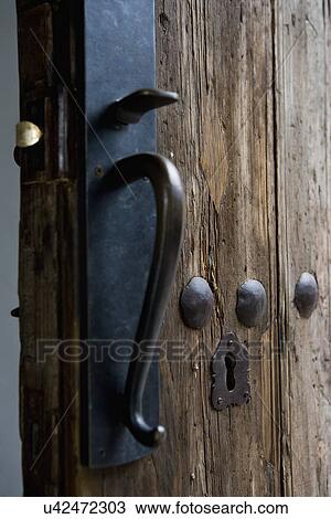 Doorknob and keyhole of old wooden door; Hollywood; California; USA View Large Photo Image Stock Image - Doorknob and keyhole of old wooden door; Hollywood; California; USA. Fotosearch