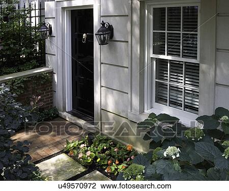 DOORS: EXTERIOR: city garden, cut limestone, brick, lanterns, garden area along brick walk, shaded hydrangea, impatiens, View Large Photo Image Stock Image - DOORS: EXTERIOR: city garden, cut limestone, brick, lanterns, garden area along brick walk, shaded hydrangea, impatiens,. Fotosearch