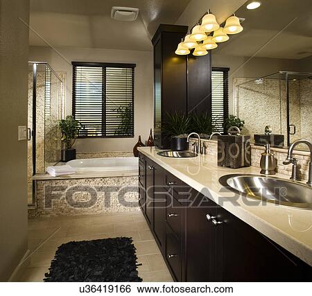 Double sinks in master bathroom; Aliso Viejo; California; USA View Large Photo Image Stock Photograph - Double sinks in master bathroom; Aliso Viejo; California; USA. Fotosearch