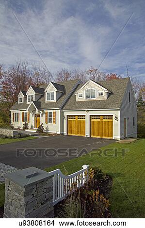 Driveway leading towards garage of single family home View Large Photo Image Picture - Driveway leading towards garage of single family home. Fotosearch