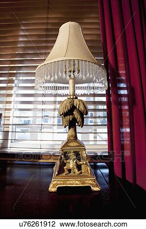 Elegant lamp on end table View Large Photo Image Stock Image - Elegant lamp on end table. Fotosearch
