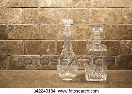 Empty glass carafes on countertop; Irvine; California; USA View Large Photo Image Picture - Empty glass carafes on countertop; Irvine; California; USA. Fotosearch